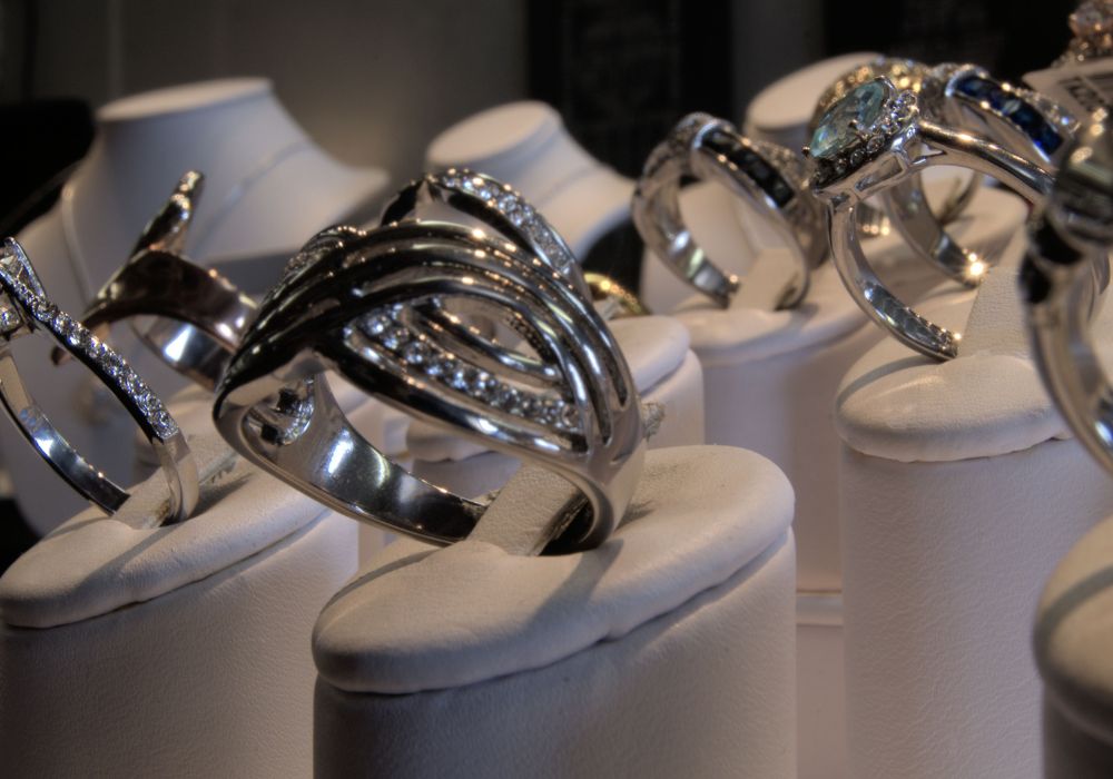 an image of stainless steel jewelry and necklaces on display. 